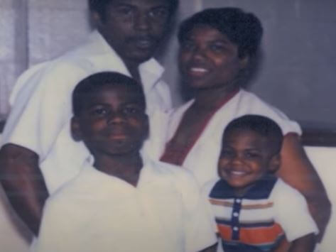 Nancy Hart with her husband and sons Robert and Kevin Hart.
